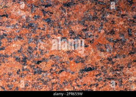 Elegante marmo rosso e marmo nero di elegante pavimento con piastrelle in marmo e solido materiale di roccia come bella architettura d'interni e elementi di design della facciata con tessuti minerali naturali Foto Stock