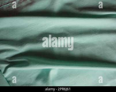 sfondo tessuto verde teal grattugiato Foto Stock