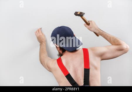 Costruttore con martello Foto Stock