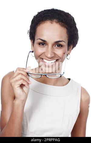 Shes ha ottenuto un sorriso vincente. Studio di una giovane donna isolata su bianco. Foto Stock