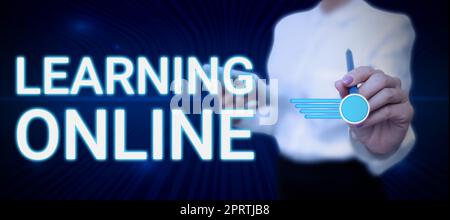 Scrittura visualizzazione di testo apprendimento OnlineImpara qualcosa di nuovo con l'aiuto di Internet e della tecnologia. Concetto significa imparare qualcosa di nuovo con l'aiuto di Internet e della tecnologia Foto Stock