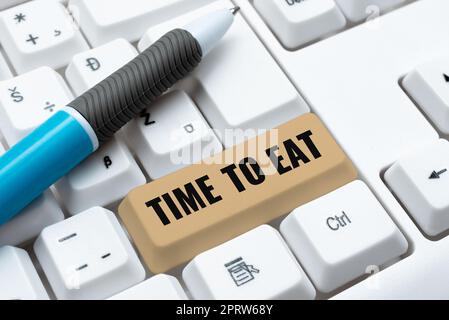 Tempo concettuale di visualizzazione per mangiare. Panoramica aziendale momento giusto per gustare un pasto pranzo cena buon cibo fame Foto Stock