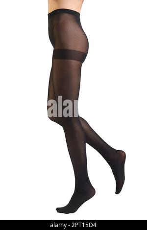 Gambe femmina sottili in collant nero stretto con effetto di serraggio Foto Stock
