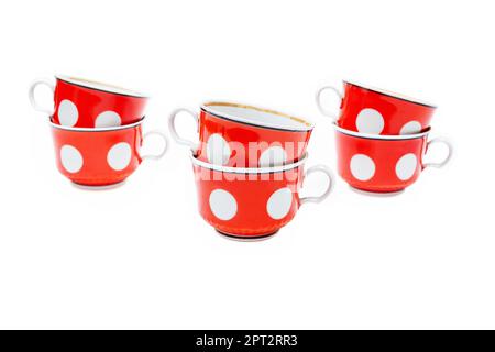 Coppe rosse su sfondo bianco, un set di sei pezzi Foto Stock