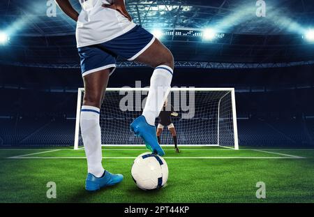 Giocatore di calcio pronto a calciare un calcio di punizione durante la partita Foto Stock