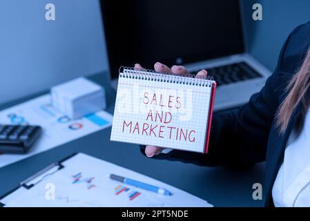 Scrittura che visualizza il testo Vendite e Marketing, Pubblicità di affari di concetto di affari, promozione e strategia commerciale Foto Stock