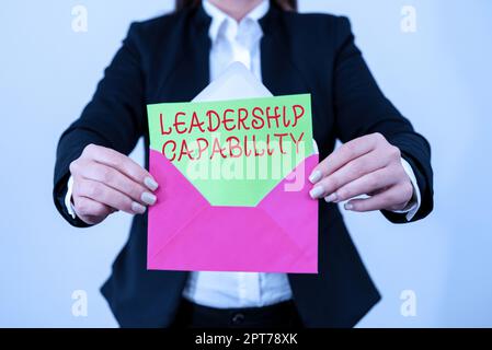 Testo che mostra ispirazione capacità di leadership, parola per ciò che un leader può costruire capacità di condurre in modo efficace Foto Stock