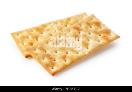 Cracker posti uno sopra l'altro su uno sfondo bianco. Foto Stock