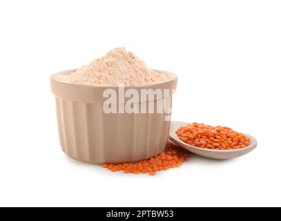 Farina di lenticchie in ciotola e semi isolati su bianco Foto Stock
