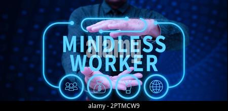 Scrittura a mano segno Mindless Worker, foto concettuale che non hanno uno scopo intelligente mostrando poca attenzione Foto Stock