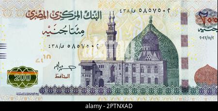 Grande frammento del lato opposto di 200 LE duecento sterline egiziane banconota serie 2022 caratteristiche Qani-Bay moschea al Cairo Egitto, fuoco selettivo Foto Stock