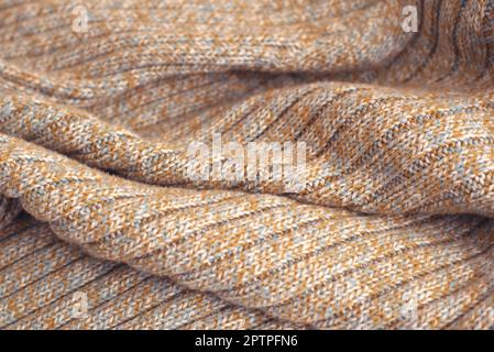 Chiazzato beige maglia maglione di lana. Texture Detail close up. Foto Stock
