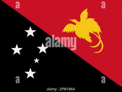 Bandiera di Papua Nuova Guinea. bandiera sulla superficie del tessuto. Struttura del tessuto. Simbolo nazionale della Papua Nuova Guinea. Paese in Oceania. Stato indipendente di Papua Foto Stock