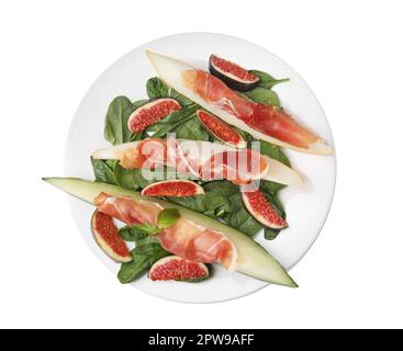 Piatto con gustosi meloni, jamon, fichi e spinaci isolato su bianco, vista dall'alto Foto Stock