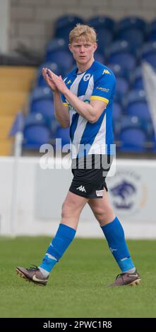 The Deva Stadium, Chester, Cheshire, Inghilterra 29th aprile 2023. Il Chester's Matty Williams batte i tifosi mentre sono assaliti, durante il Chester Football Club V Buxton Football Club, nella Vanarama National League North (Credit Image: ©Cody Froggatt/Alamy Live News) Foto Stock