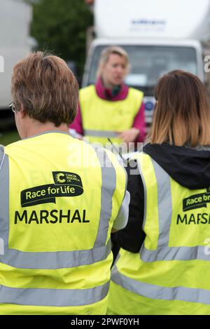 Race for Life Volunteers all'evento Milton Keynes Foto Stock