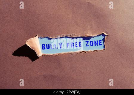 Didascalia testo presentare Bully Free zone, approccio aziendale essere rispettosi di altri bullismo non è consentito qui Foto Stock