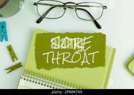 Scrittura a mano segno dolorante Throat, Business approccio infiammazione ot la faringe e le fauce è risultato da un'irritazione Foto Stock