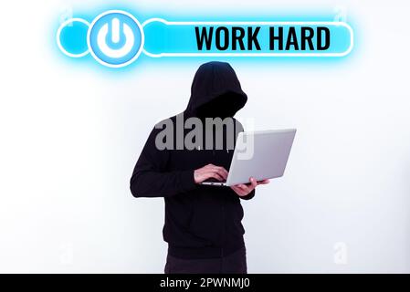 Scrivere visualizzare testo lavoro duro, Word per lavorare che mette sforzo nel fare e completare le attività Foto Stock