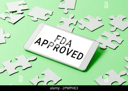 Didascalia di testo che presenta FDA approvato, Word scritto su FDA ha accettato il prodotto o la formula è sicuro e o efficace Foto Stock