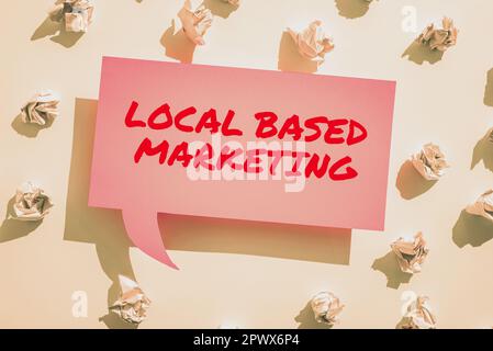 Scrittura che visualizza il testo Marketing locale basato, modo di marketing di approccio aziendale che dipende dalla posizione del cliente Foto Stock