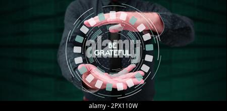 Testo di scrittura sia riconoscente, sensibilità di concetto del Internet o mostrando un apprezzamento per qualcosa ricevuto Foto Stock