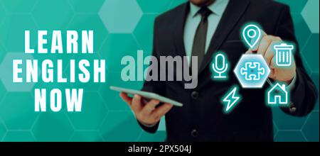 Mostra di segno Impara l'inglese ora, vetrina di affari guadagnare o acquisire conoscenze e competenze di lingua inglese Foto Stock
