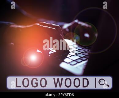 Testo che mostra il legno del logo di ispirazione. Parola scritta su disegno riconoscibile o simbolo di un'azienda inscritta su legno Foto Stock