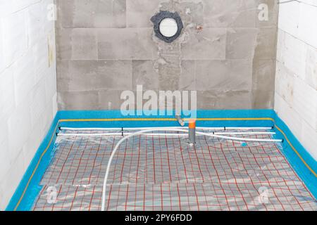 installazione di un nuovo riscaldamento a pavimento Foto Stock