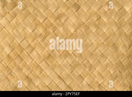 Tappeto in bambù tessuto beige. Sfondo orizzontale Foto Stock