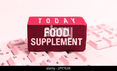 Ispirazione che mostra il segno Food Supplement. Parola per le condizioni e le pratiche che preservano la qualità del cibo Foto Stock