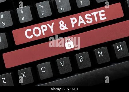 Segno di testo che mostra Copia Incolla. Concetto che significa imitazione, trascrizione o riproduzione di un'opera originale Foto Stock