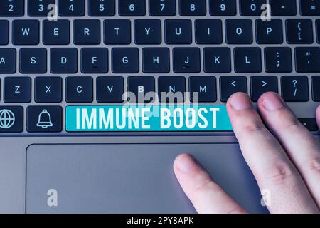 Scrittura a mano testo immune Boost. Vetrina di business essere in grado di resistere a una particolare malattia che impedisce lo sviluppo di agenti patogeni Foto Stock