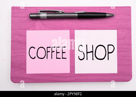 Cartello di testo che mostra il Coffee Shop. Parola scritta su un piccolo ristorante informale che serve caffè e spuntini leggeri Foto Stock