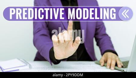 Scrittura con visualizzazione del testo Predictive Modeling (modellazione predittiva). Parola per la strategia di manutenzione basata sull'analisi predittiva Foto Stock