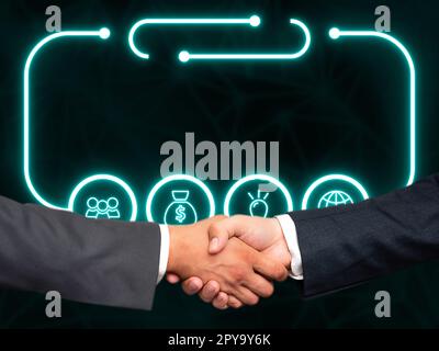 Due uomini in tuta che stringono la mano davanti a uno sfondo futuristico con bagliore colorato. Nuove tecnologie digitali del futuro. La stretta di mano rappresenta un accordo. Foto Stock