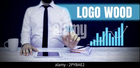 Didascalia concettuale Logo legno. Parola scritta su disegno riconoscibile o simbolo di un'azienda inscritta su legno Foto Stock