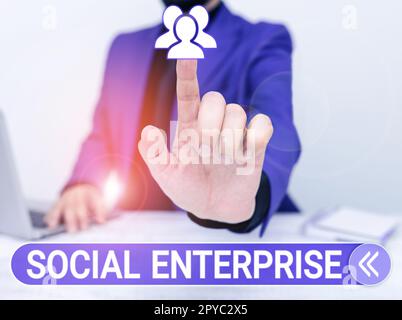 Ispirazione che mostra il segno Social Enterprise. Business Concept Business che fa soldi in modo socialmente responsabile Foto Stock