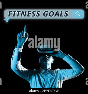 Scrittura visualizzazione testo Fitness Goals. Concetto che significa sciolto grasso costruire muscolo ottenere più forte condizionamento Foto Stock