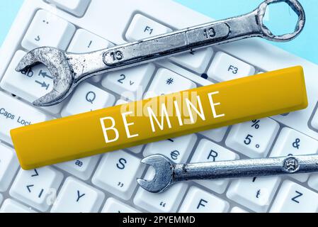 Segno che mostra Be Mine. Parola per come una persona più di un amico e vorrebbe datarli Foto Stock