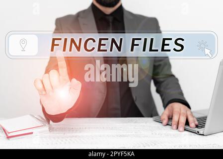 File FinCEN con didascalia concettuale. Operazioni di concetto aziendale in attività e passività finanziarie Foto Stock