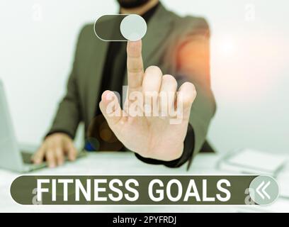 Scrittura visualizzazione testo Fitness Goals. Panoramica del business grasso sciolto costruire muscolo ottenere più forte condizionamento Foto Stock