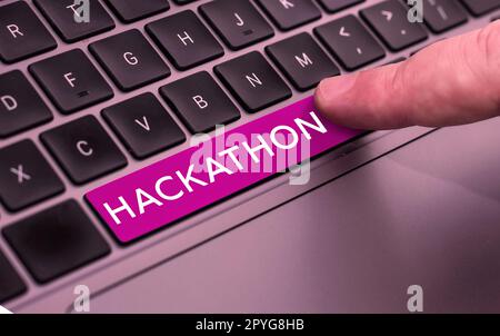 Scrittura a mano del testo Hackathon. Evento di presentazione aziendale in cui un gran numero di persone si impegna nella programmazione Foto Stock