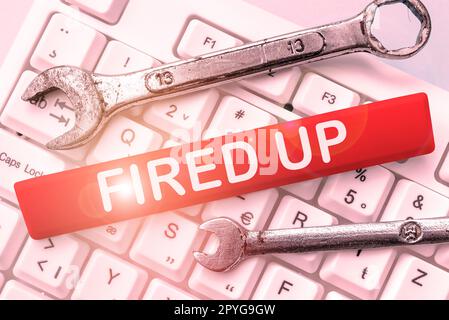 Didascalia di testo che presenta Fired Up. L'approccio aziendale significa che qualcuno si è energizzato e in stato di entusiasmo per l'evento Foto Stock