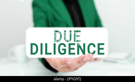 Didascalia di testo con due diligence. Idea di business evitare di danneggiare altri beni aziendali per un accordo Foto Stock