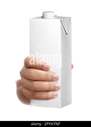 scatola di latte o succo in mano isolata su fondo bianco Foto Stock