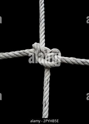 Nodo in corda su sfondo nero. Concetto di unità Foto Stock