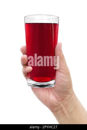 tenere a mano il succo di melograno in un bicchiere. con su sfondo bianco Foto Stock