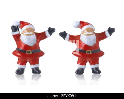 babbo natale bambole in ceramica carino statue decorazioni a buon Natale con su sfondo bianco Foto Stock