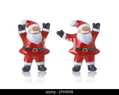babbo natale bambole in ceramica carino statue decorazioni a buon Natale con su sfondo bianco Foto Stock